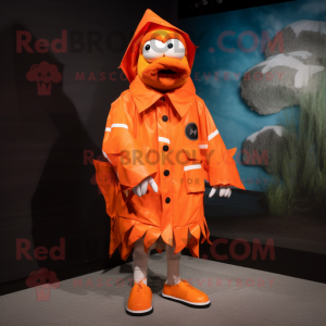 Rust Clown Fish mascot costume character dressed with a Raincoat and Shoe clips
