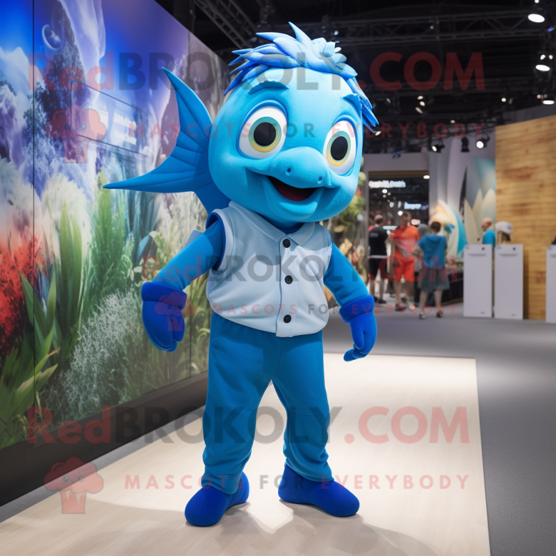 Blue Goldfish mascot costume character dressed with a Joggers and Suspenders Blue Goldfish mascot costume character dressed with a Joggers and Suspenders