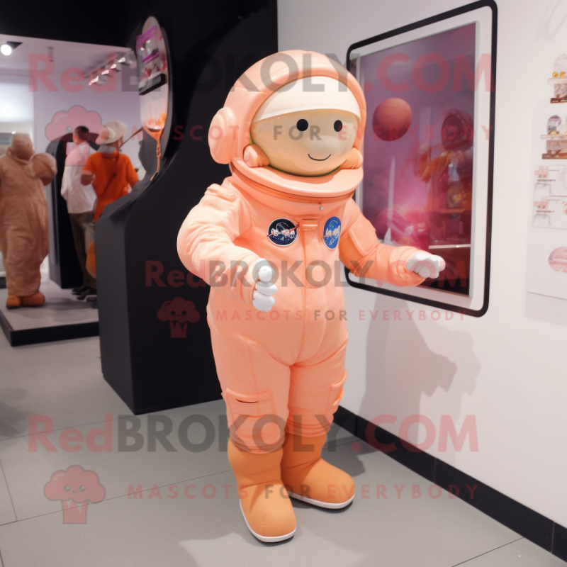 Peach Astronaut mascot costume character dressed with a A-Line Dress and Brooches