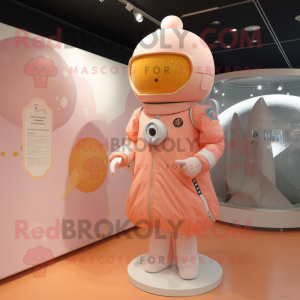Peach Astronaut mascot costume character dressed with a A-Line Dress and Brooches