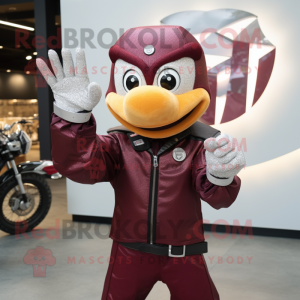 Maroon Engagement Ring mascot costume character dressed with a Moto Jacket and Rings