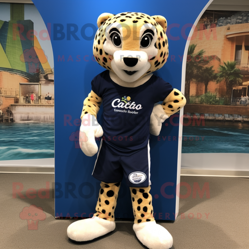 Navy Cheetah mascot costume character dressed with a Board Shorts and Shoe clips Navy Cheetah mascot costume character dressed with a Board Shorts and Shoe clips