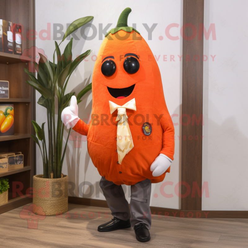 Orange Pepper mascot costume character dressed with a Cardigan and Pocket squares Orange Pepper mascot costume character dressed with a Cardigan and Pocket squares