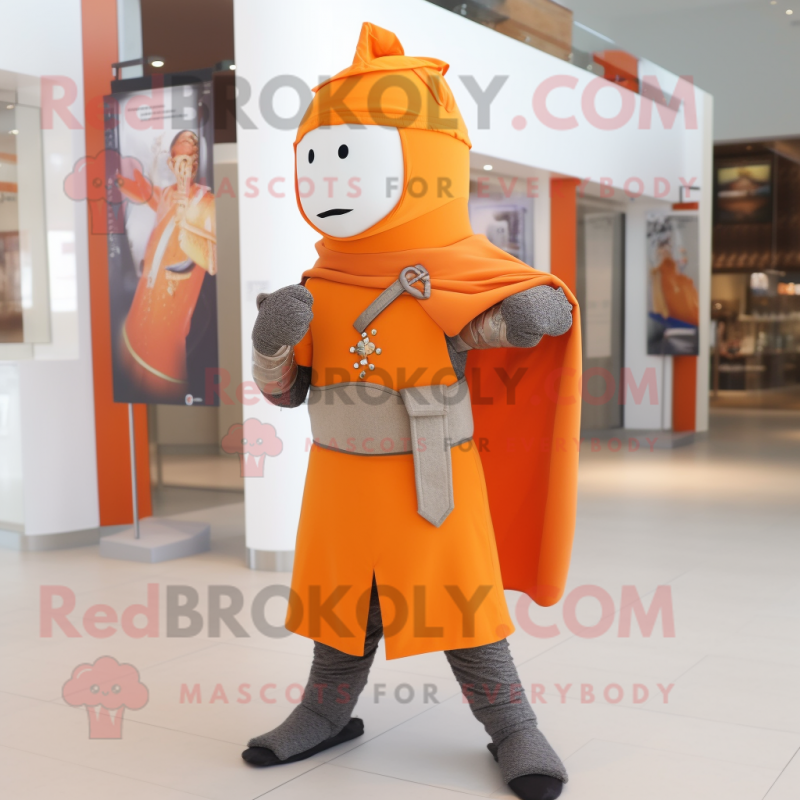 Orange Medieval Knight mascot costume character dressed with a Chinos and Scarf clips Orange Medieval Knight mascot costume character dressed with a Chinos and Scarf clips