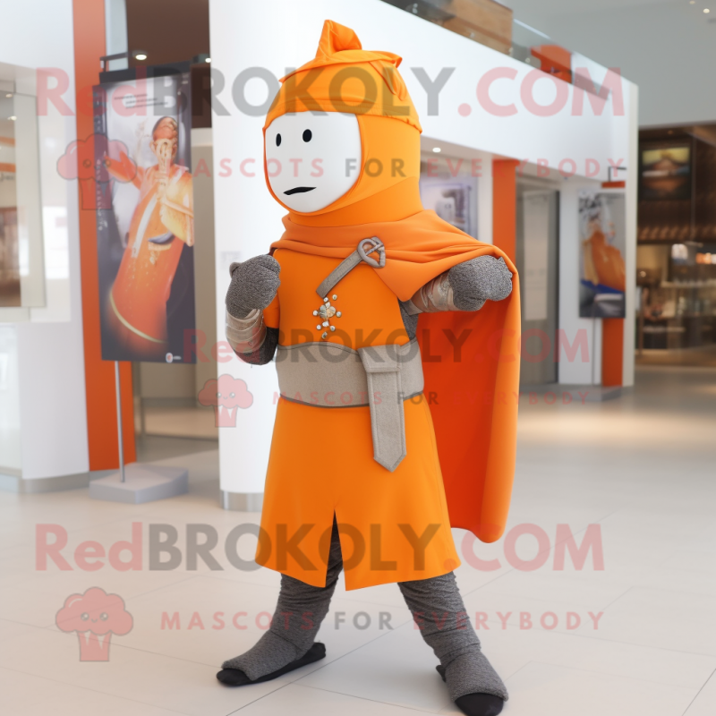 Orange Medieval Knight mascot costume character dressed with a Chinos and Scarf clips