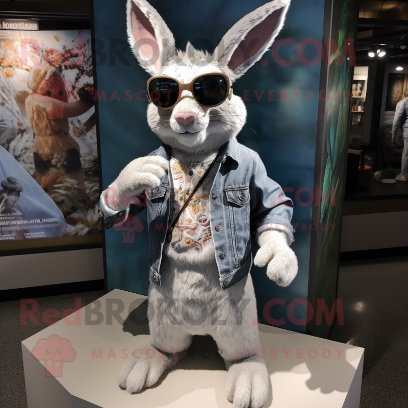 Silver Wild Rabbit mascot costume character dressed with a Chinos and Sunglasses Silver Wild Rabbit mascot costume character dressed with a Chinos and Sunglasses