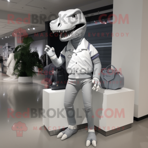 Silver Tyrannosaurus mascot costume character dressed with a Polo Tee and Handbags