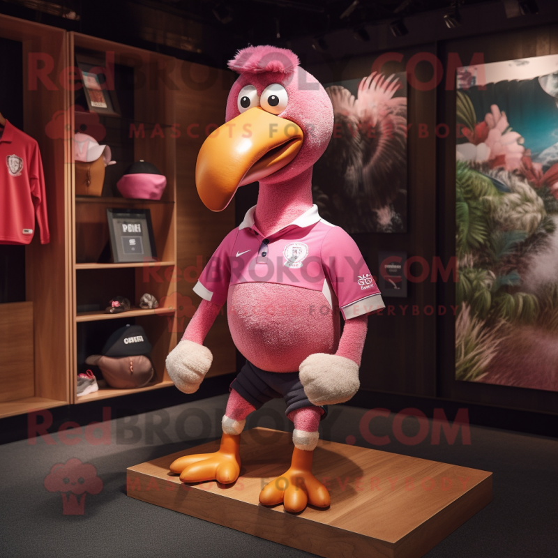 Pink Dodo Bird mascot costume character dressed with a Rugby Shirt and Shoe laces Pink Dodo Bird mascot costume character dressed with a Rugby Shirt and Shoe laces