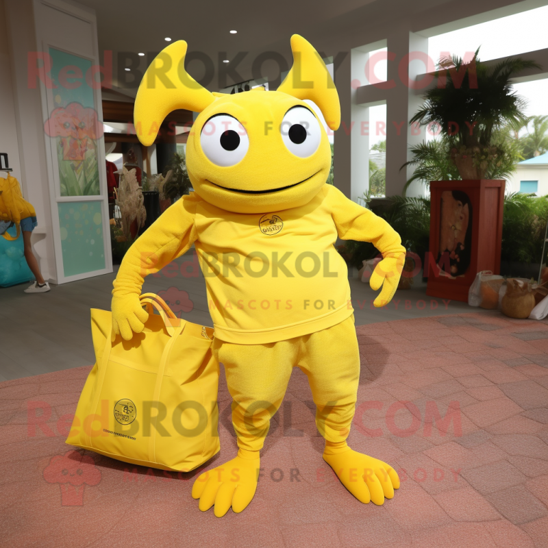 Lemon Yellow Crab mascot costume character dressed with a Joggers and Tote bags