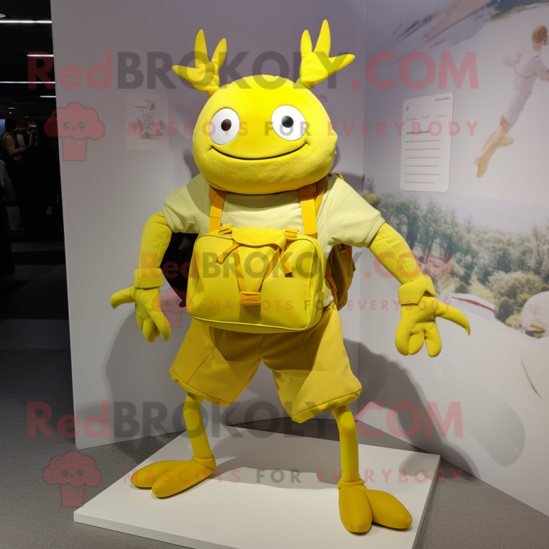 Lemon Yellow Crab mascot costume character dressed with a Joggers and Tote bags