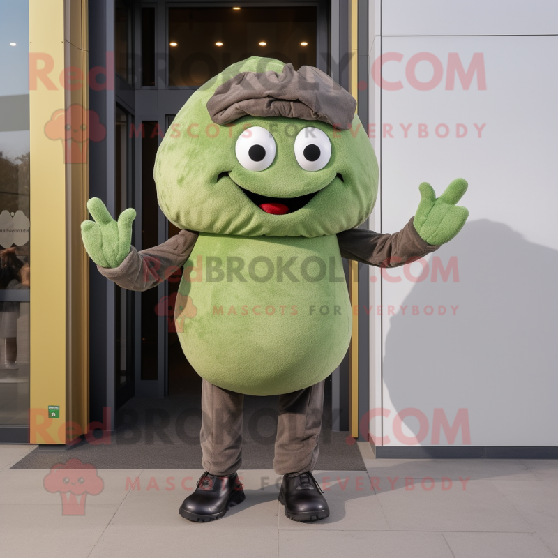 Olive Meatballs mascot costume character dressed with a Skinny Jeans and Gloves Olive Meatballs mascot costume character dressed with a Skinny Jeans and Gloves