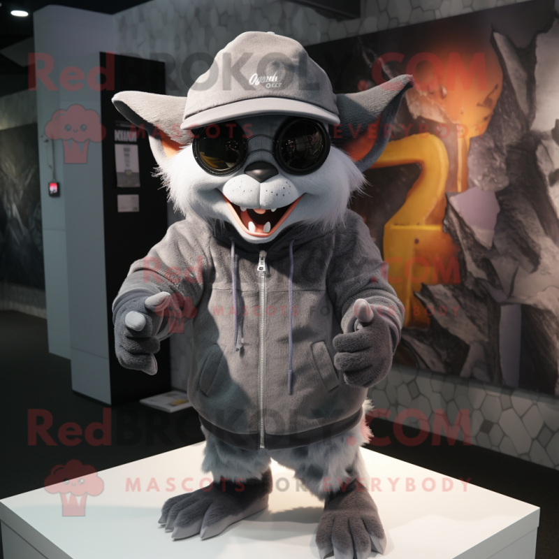 Gray Gargoyle mascot costume character dressed with a Hoodie and Berets Gray Gargoyle mascot costume character dressed with a Hoodie and Berets