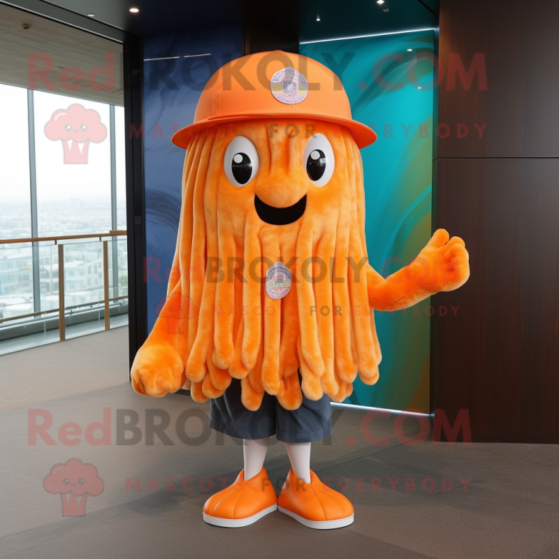 Orange Jellyfish mascot costume character dressed with a Capri Pants and Hat pins