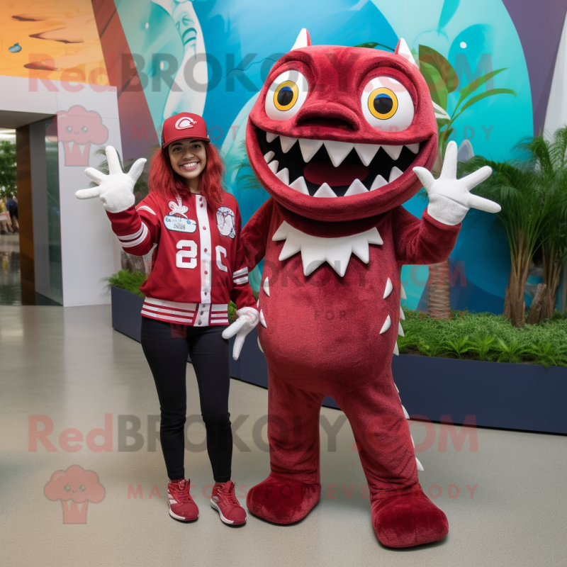 Maroon Barracuda mascot costume character dressed with a Mom Jeans and Rings