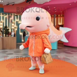 Peach Humpback Whale mascot costume character dressed with a Sweater and Handbags