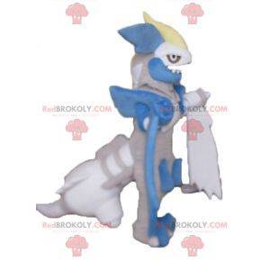 Mascotte drago grigio blu e bianco che sembra feroce -