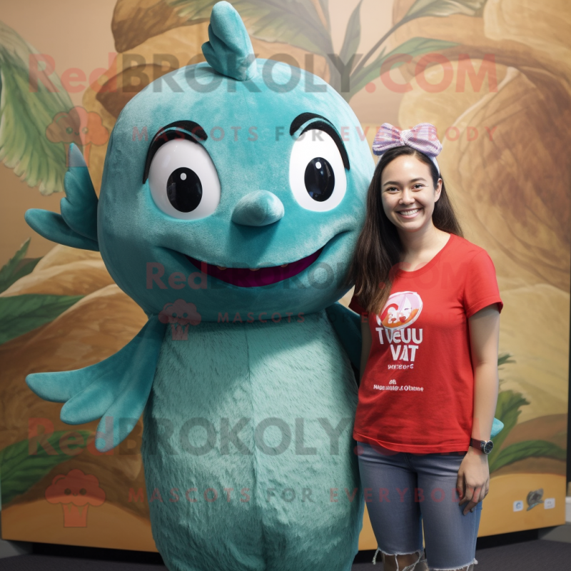Teal Tuna mascot costume character dressed with a V-Neck Tee and Hair clips Teal Tuna mascot costume character dressed with a V-Neck Tee and Hair clips