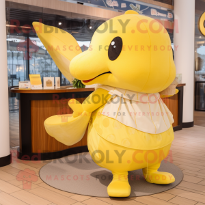 Lemon Yellow Whale mascot costume character dressed with a Maxi Skirt and Wallets