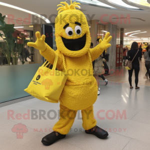 Yellow Paella mascot costume character dressed with a Jumpsuit and Tote bags