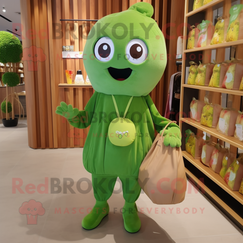 Olive Candy mascot costume character dressed with a Long Sleeve Tee and Tote bags Olive Candy mascot costume character dressed with a Long Sleeve Tee and Tote bags
