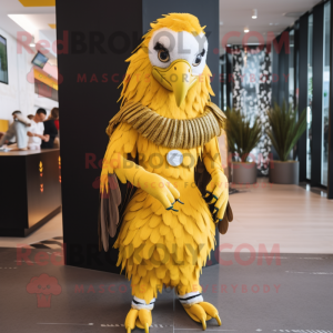 Yellow Eagle mascot costume character dressed with a Midi Dress and Bracelets