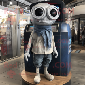 Silver Gyro mascot costume character dressed with a Denim Shorts and Scarves