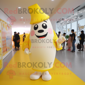 Yellow Bottle Of Milk mascot costume character dressed with a Leggings and Hats