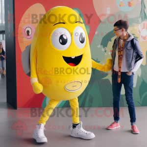 Yellow Shakshuka mascot costume character dressed with a Skinny Jeans and Watches