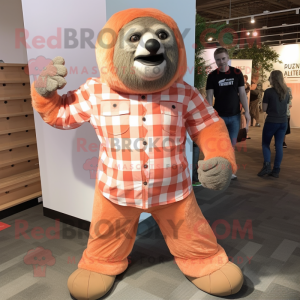 Peach Giant Sloth mascot costume character dressed with a Flannel Shirt and Foot pads