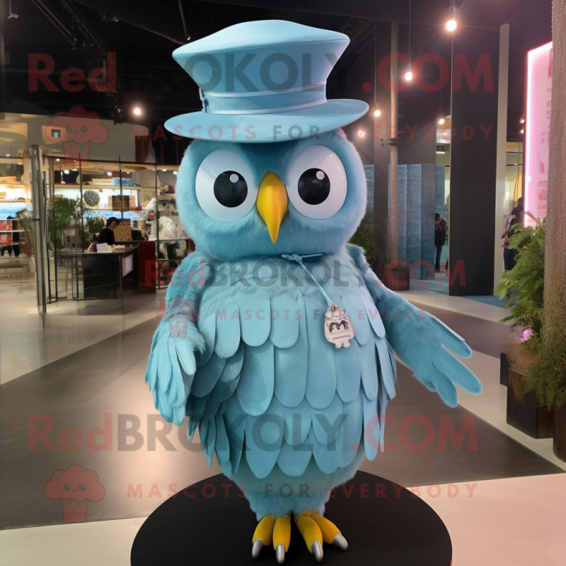 Sky Blue Owl mascot costume character dressed with a Pleated Skirt and Hat pins Sky Blue Owl mascot costume character dressed with a Pleated Skirt and Hat pins
