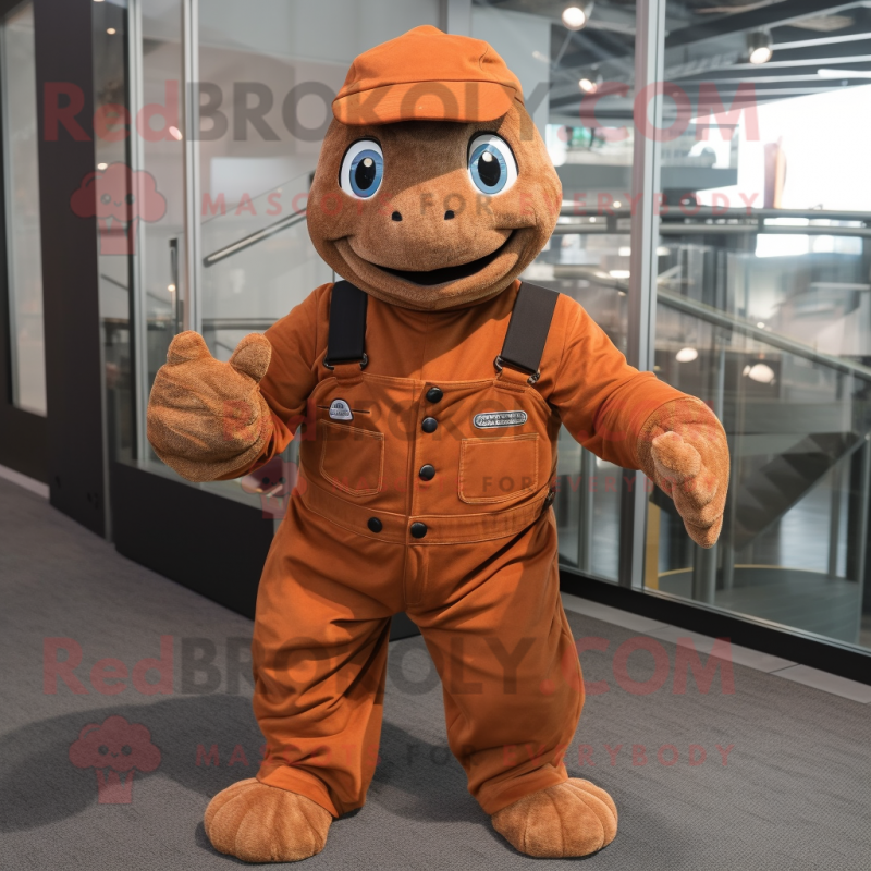 Rust Turtle mascot costume character dressed with a Overalls and Cufflinks Rust Turtle mascot costume character dressed with a Overalls and Cufflinks