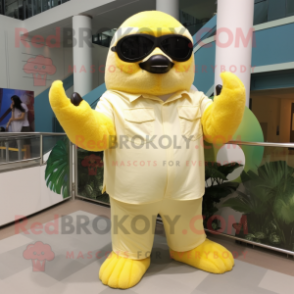 Lemon Yellow Giant Sloth mascot costume character dressed with a Poplin Shirt and Sunglasses