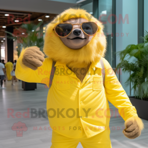Lemon Yellow Giant Sloth mascot costume character dressed with a Poplin Shirt and Sunglasses
