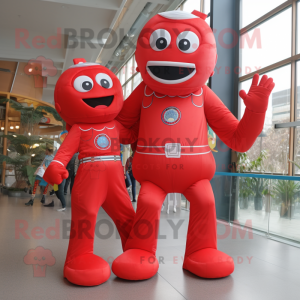 Red Superhero mascot costume character dressed with a Boyfriend Jeans and Suspenders