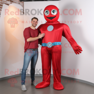 Red Superhero mascot costume character dressed with a Boyfriend Jeans and Suspenders