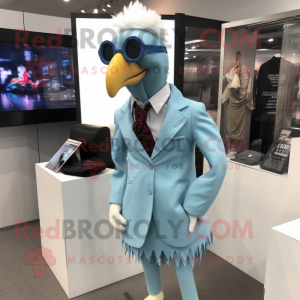 Cyan Chicken mascot costume character dressed with a Dress Pants and Tie pins