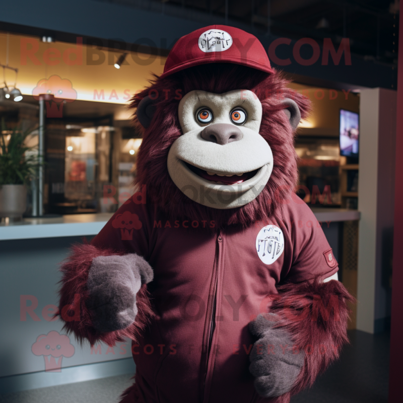 Maroon Gorilla mascot costume character dressed with a Sweater and Caps