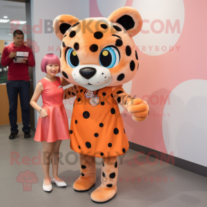 Peach Jaguar mascot costume character dressed with a Mini Skirt and Ties