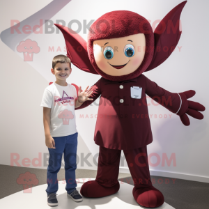 Maroon Tooth Fairy mascot costume character dressed with a Oxford Shirt and Shoe laces