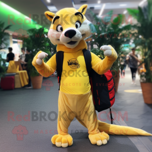Yellow Thylacosmilus mascot costume character dressed with a Yoga Pants and Backpacks
