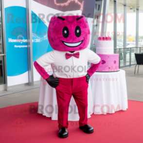 Magenta Wedding Cake mascot costume character dressed with a Joggers and Bow ties