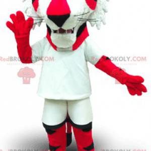 Mascote tigre vermelho e branco com olhos amarelos -