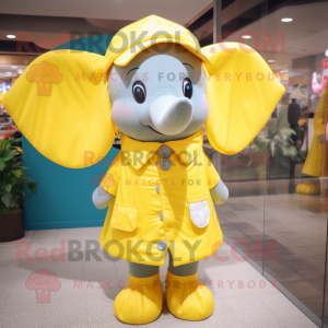Yellow Elephant mascot costume character dressed with a Raincoat and Scarf clips