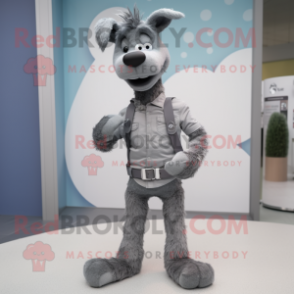 Gray Dog mascot costume character dressed with a Skinny Jeans and Smartwatches