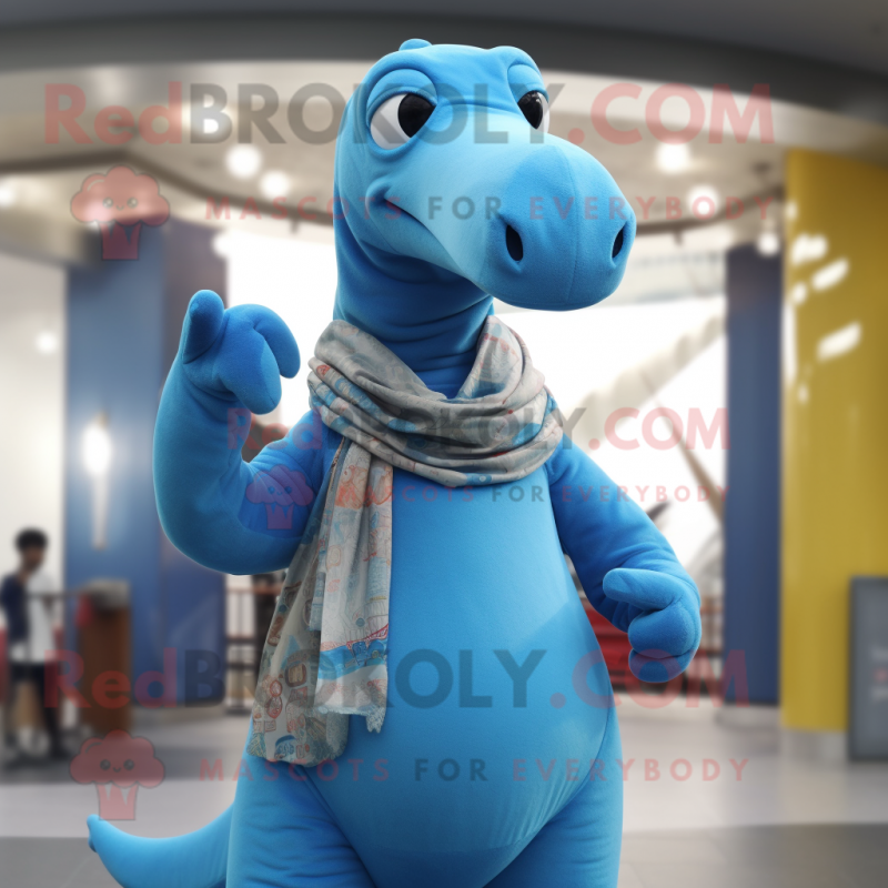 Sky Blue Diplodocus mascot costume character dressed with a Cardigan and Rings Sky Blue Diplodocus mascot costume character dressed with a Cardigan and Rings