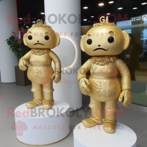 Gold Wedding Cake mascot costume character dressed with a Bodysuit and Clutch bags