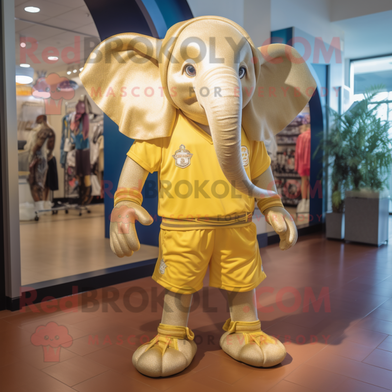 Gold Elephant mascot costume character dressed with a Bermuda Shorts and Anklets