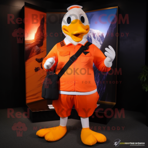 Orange Geese mascot costume character dressed with a Capri Pants and Messenger bags