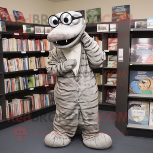 Silver Titanoboa mascot costume character dressed with a Cardigan and Reading glasses