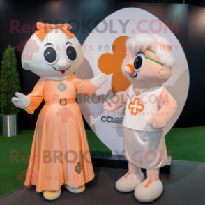 Peach Celtic Cross mascot costume character dressed with a Wedding Dress and Ties